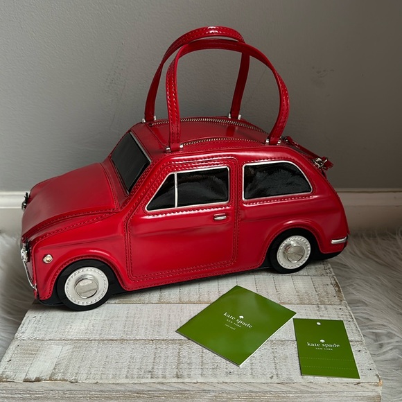 kate spade Handbags - nwt kate spade rose colored glasses red car novelty bag